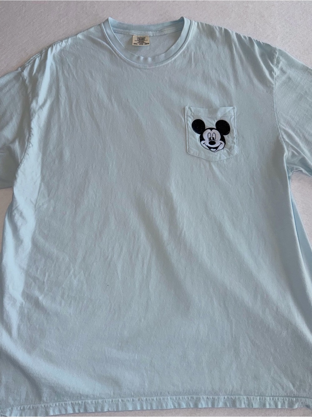 Mickey Light Blue Pocket Tee by Comfort Colors.
